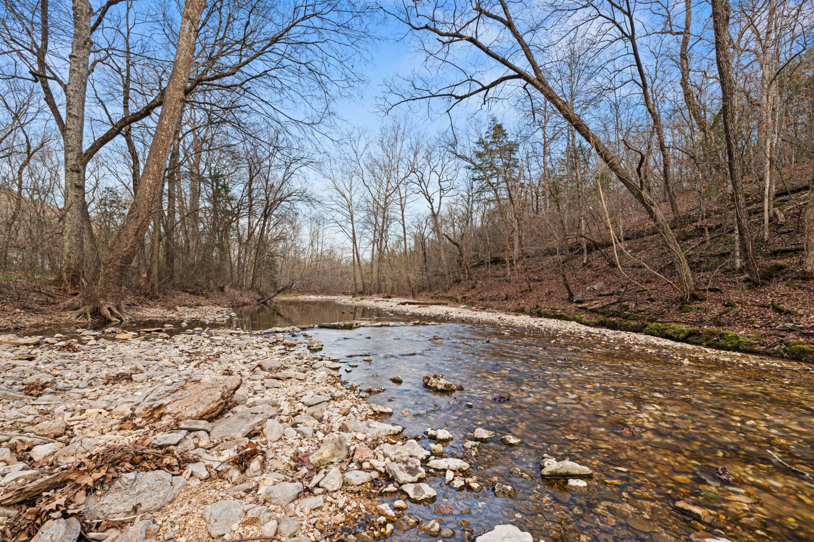 The rocky seasonal creek behind the cabin
