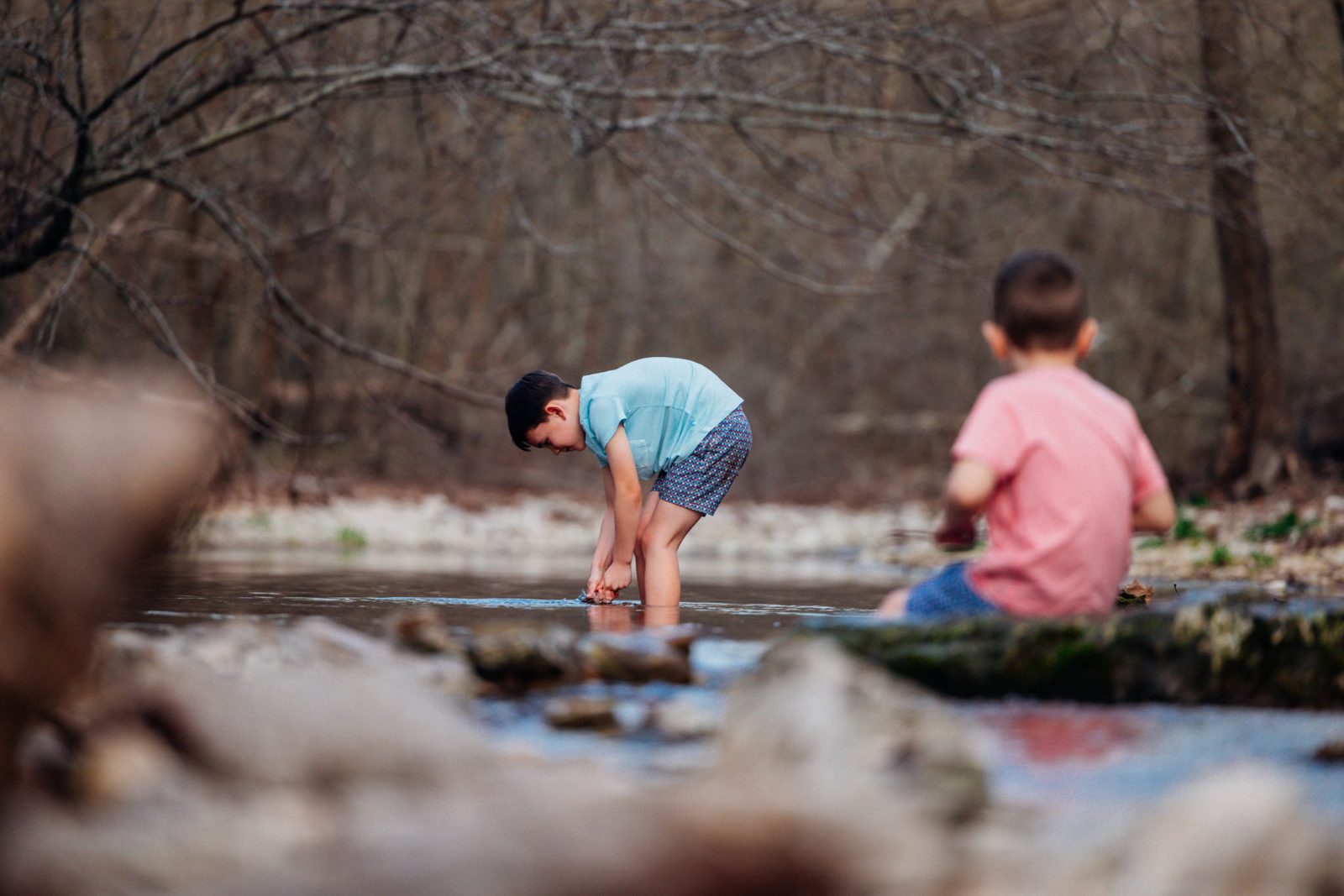 Kids playing in the creek